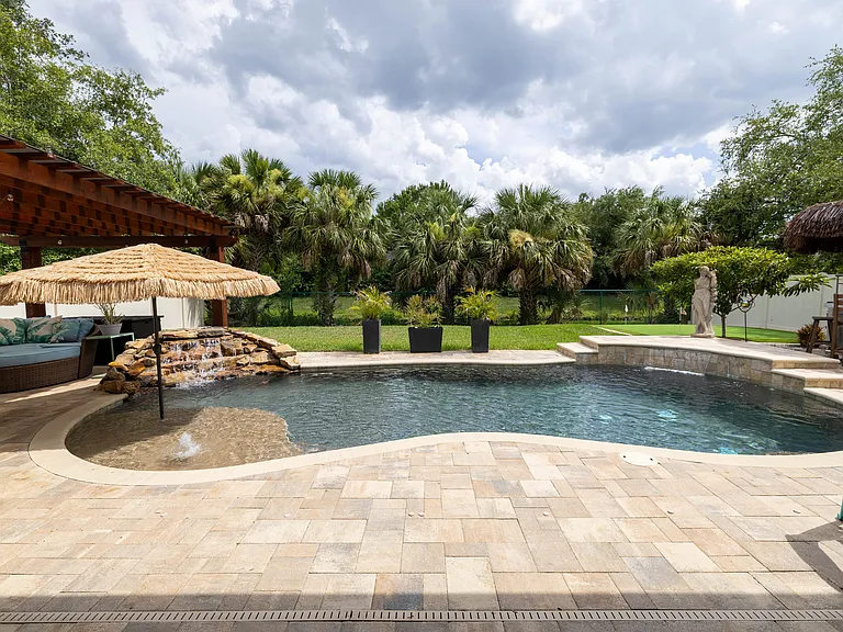 Pool with Beach Area and 2 Waterfalls