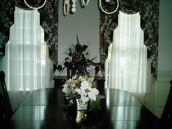 Formal Dining with Hardwood, extensive dentil moulding 