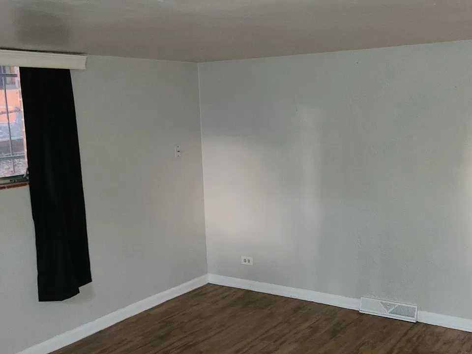 living area showing hall to bedroom and bathroom