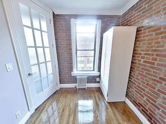 2nd image of 410 E 13th St APT 6A