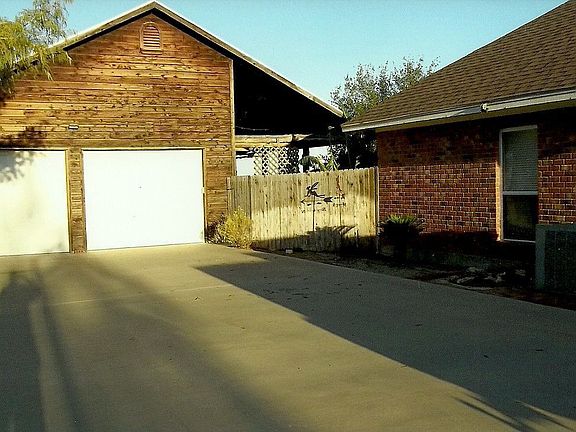 2-Car Detached Garage with 1/2 Bath