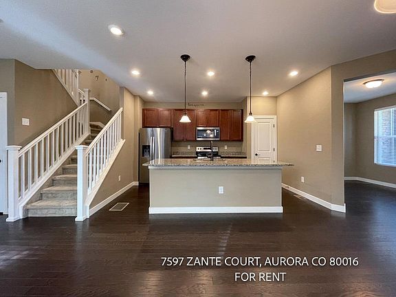 Kitchen with Marble counter, Stainless steel appliances.