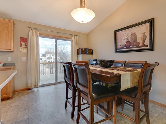 Dining room with slider that lead you to the deck for your outdoor grilling and entertainment.