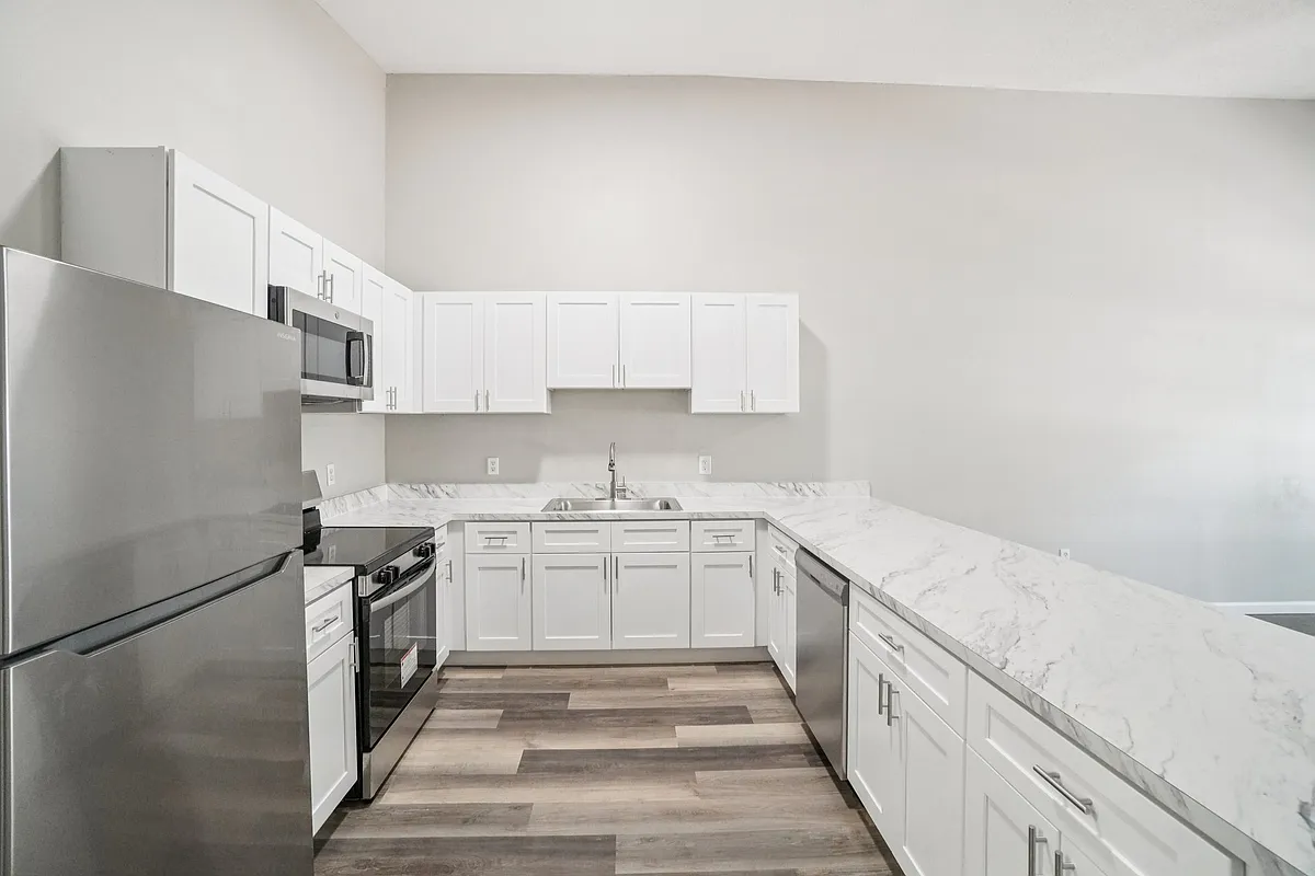 Chef's dream: Brand-new kitchen with stylish countertops and all-new stainless steel appliances. - 8509 N Hyaleah Rd