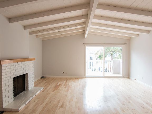 Living room with fireplace and new hardwood floors