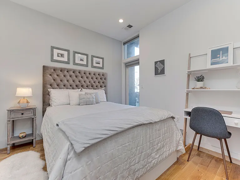 Second Bedroom with desk & small balcony.