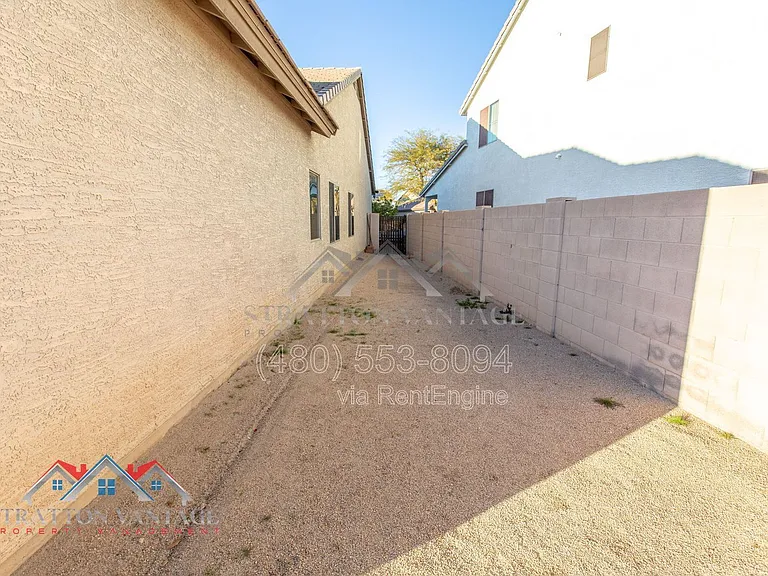 11751 W Daley Ln — Photo 44