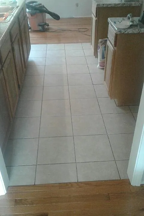 Real oak hard wood floors and tile throughout.