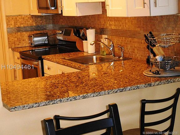 5th image of 2751 N Palm Aire Dr APT 207
