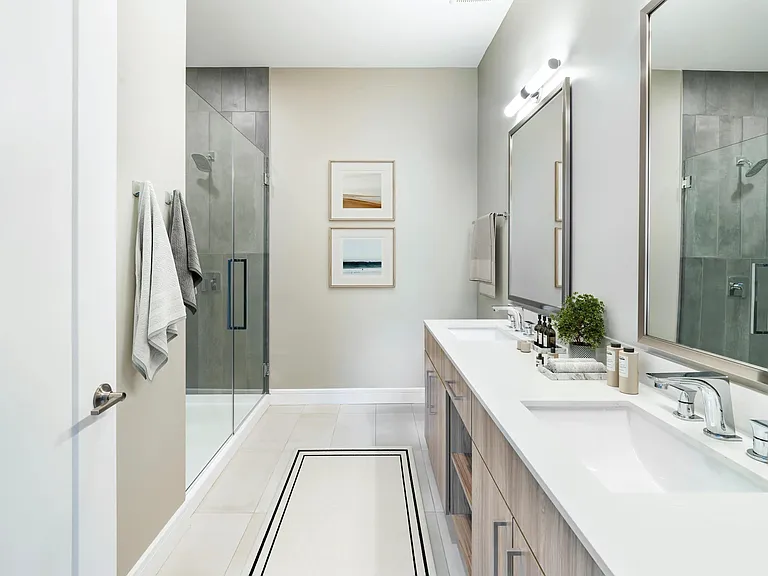 Spa-inspired bathrooms feature select homes with sleek glass showers and dual vanities designed for both style and function.