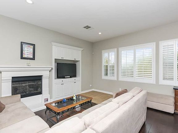 Living Room with TV and Fireplace