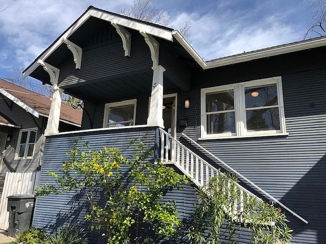 Welcome to 2727 33rd St, left side unit in a beautiful 1918 duplex, with front porch, 9 foot ceilings, large windows on a tree lined street.