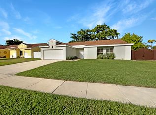 9933 Robins Nest Rd, Boca Raton, FL 33496