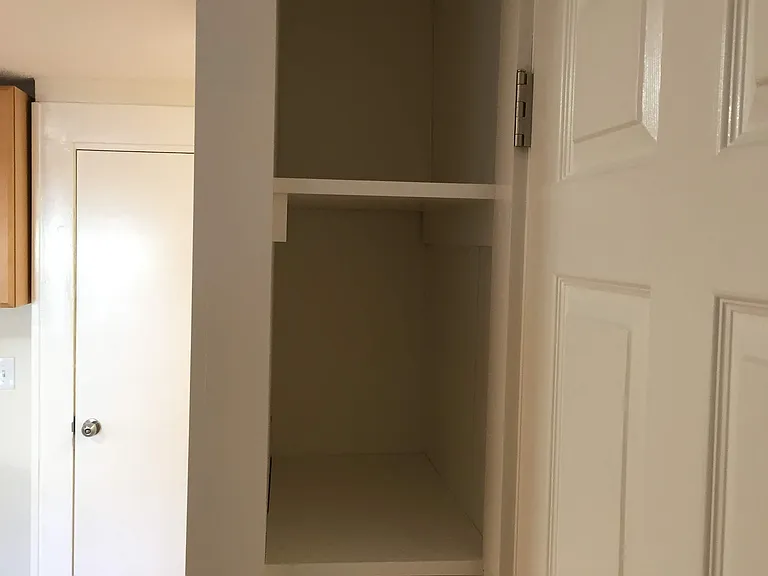 Linen closet outside bathroom
