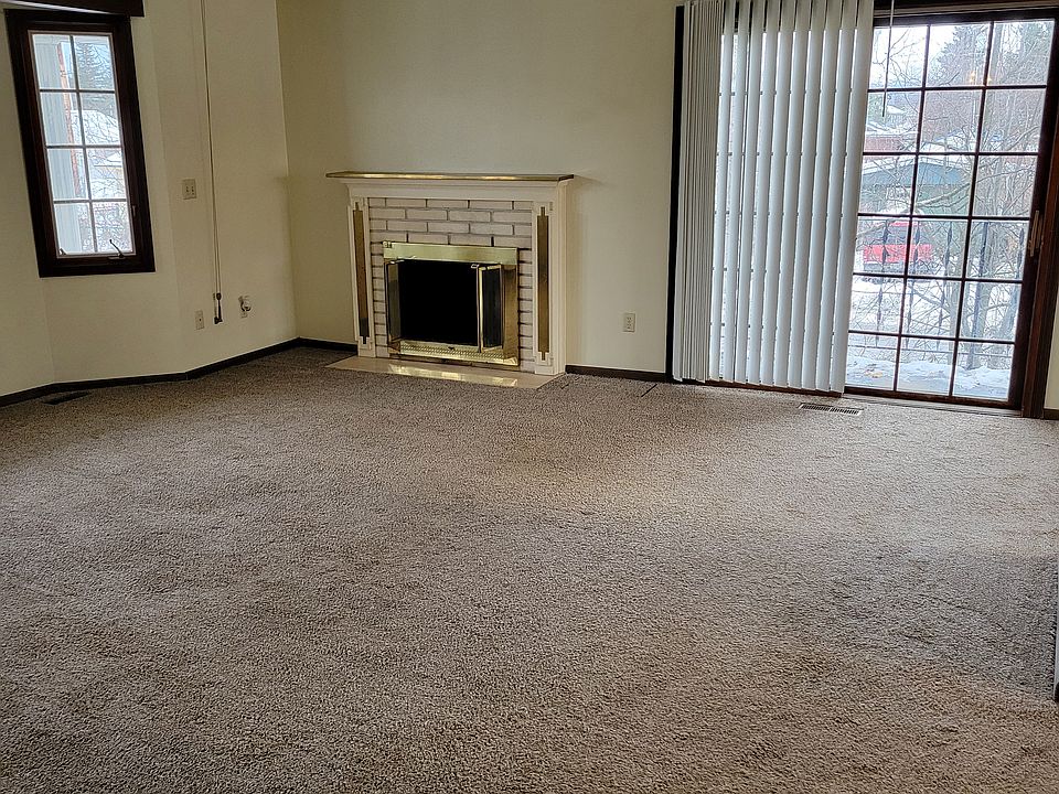Living room, fireplace and balcony door