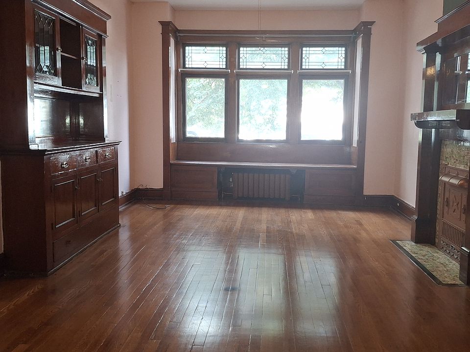 Large living room and eating space, 100 year old built in's!!