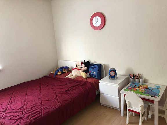 Upstairs midsize kids bedroom #1