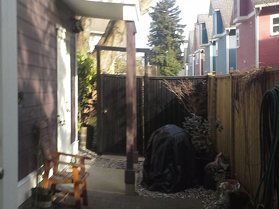 Personal space facing south. Door to storage space under stairway up to living area.