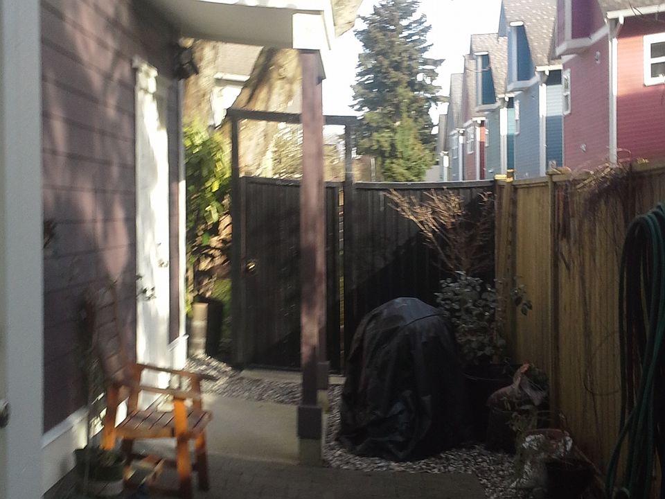 Personal space facing south. Door to storage space under stairway up to living area.