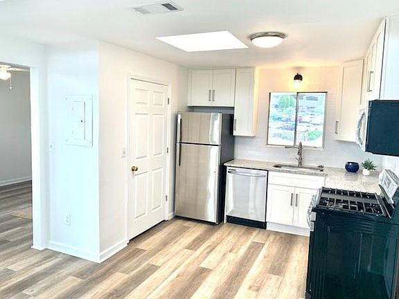 Bright new kitchen with pantry & laundry room (W/D included) adjoins a separate space, perfect for dining room or home office.