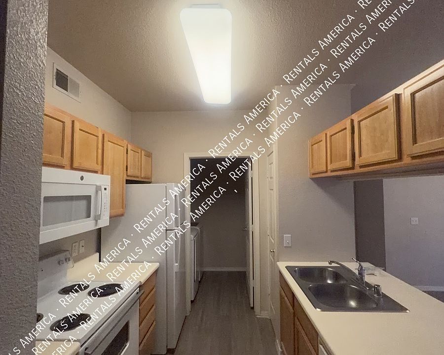 1st image of 5401 E Van Buren St Unit 3037