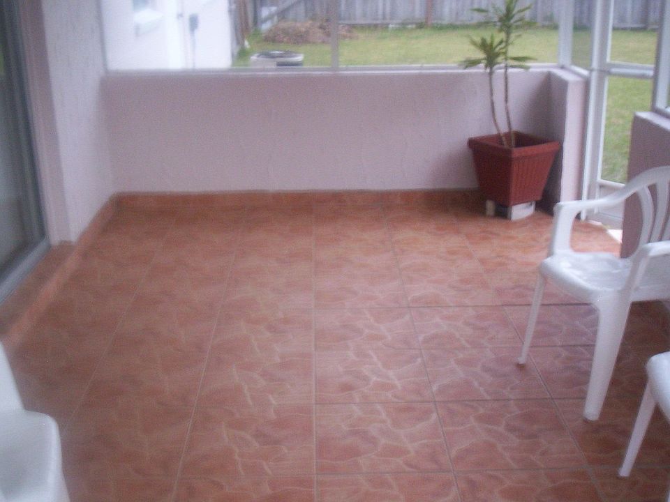 Covered and tiled patio