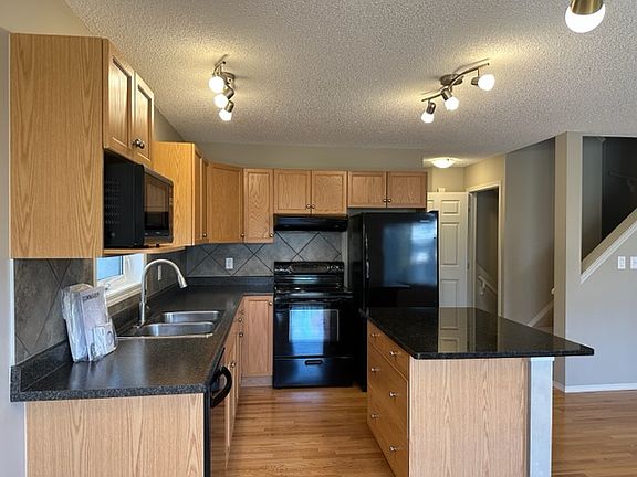 4th image of 1730 Leger Gate NW #23
