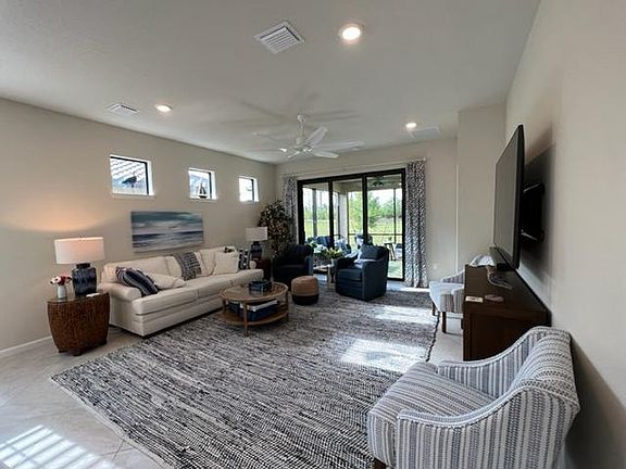 living room with wall mount TV