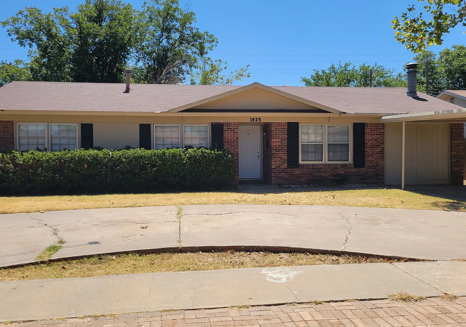 Updated 3-Bedroom Home with Carport and Storage Building — Photo 1