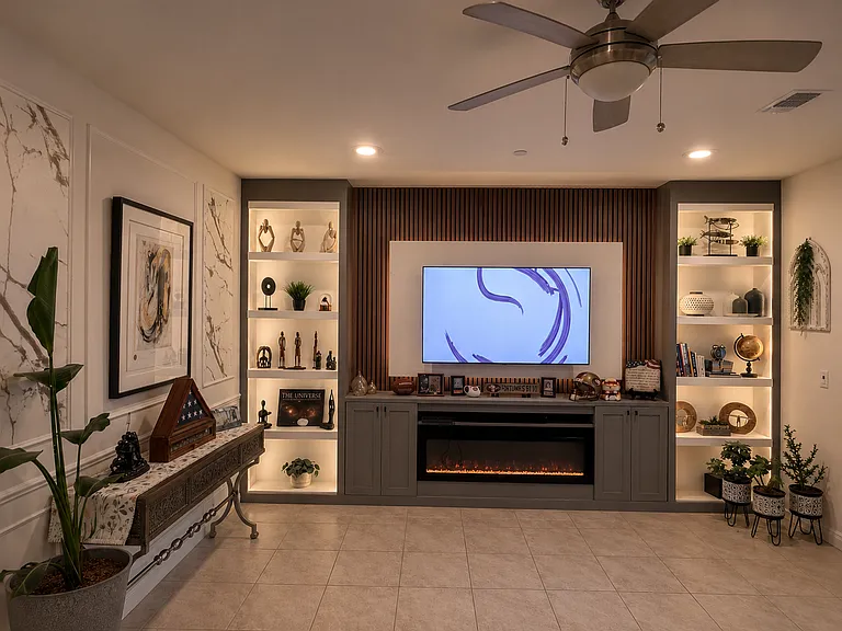 Entertainment center with lighting and electric fireplace