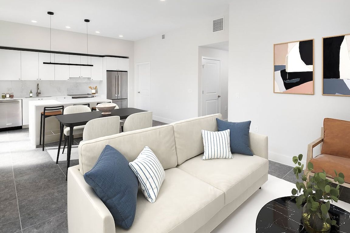 Signature Collection Townhome living, dining, and kitchen area