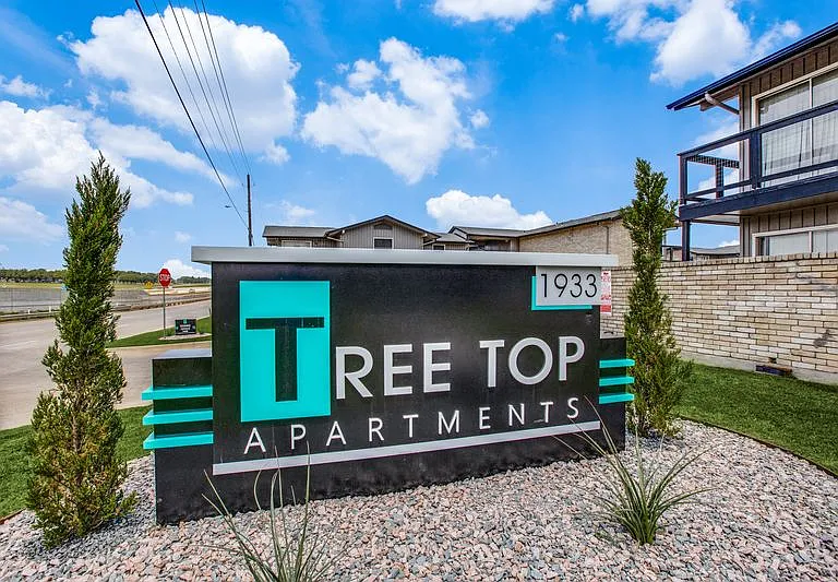 Tree Top Apartments — Photo 1