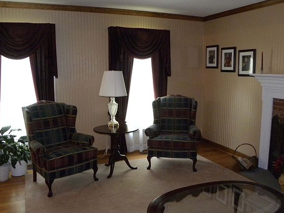 Livingroom 15'X 13' 2" bb fire plce, hwd flr, crn mld, ceiling to flr windows