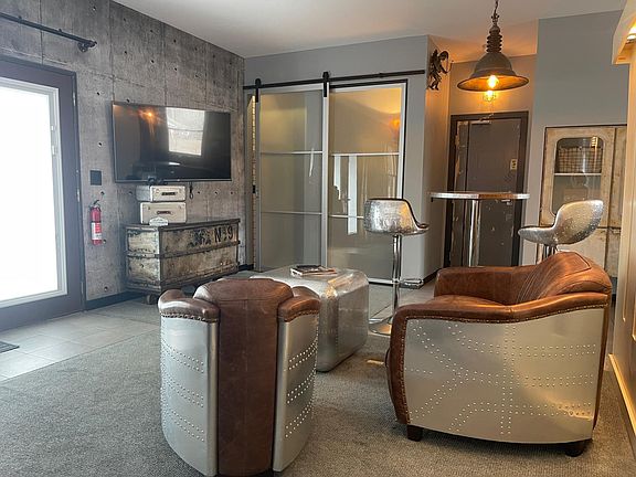 Steampunk Suite 50" Articulated Wall Mounted TV