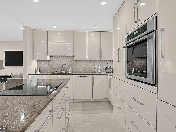 2nd image of 700 Park Regency Pl NE APT 604