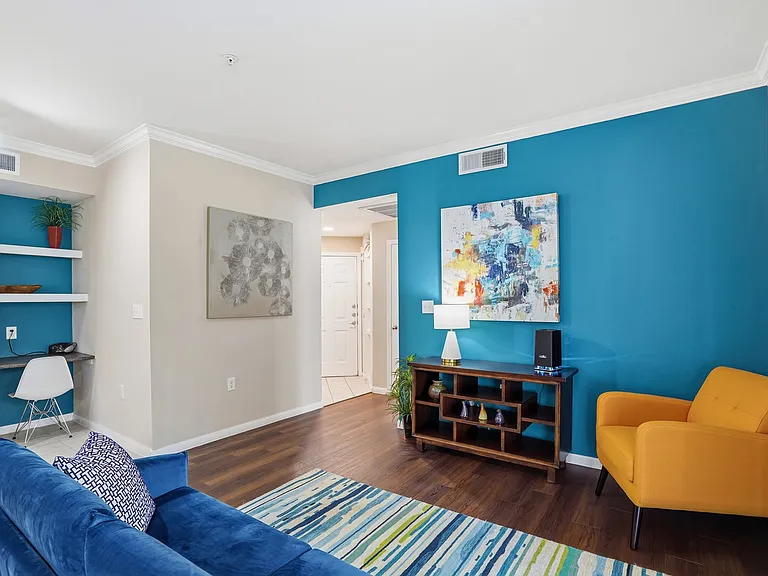 Open concept livingroom off of the entry with spacious layout