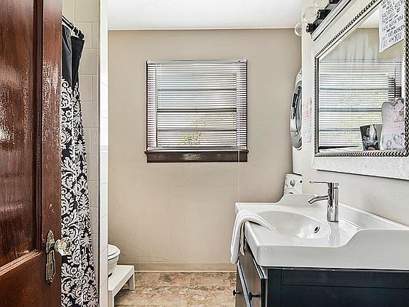 Bathroom (washer and dryer included for tenant).