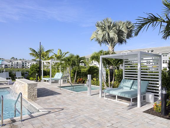 Pool Deck with Heated Spa at Everly Apartments in Naples, FL