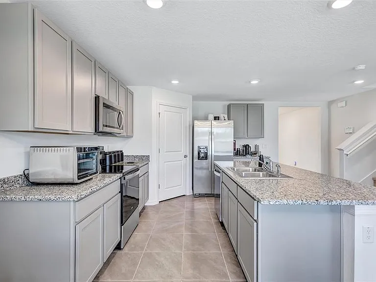 7601 Rosewood Garden Loop — Photo 10