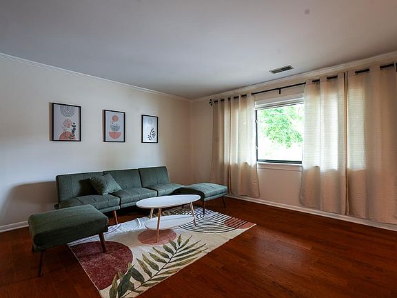 Bright and modern furnished living room.