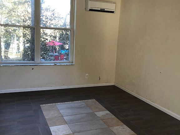 Large front room entering studio apartment