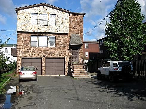 2 Family, 2 car garage, tons of parking! 