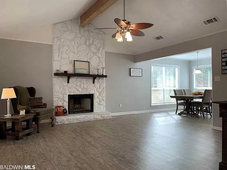Open concept living/dining room with lots of natural light