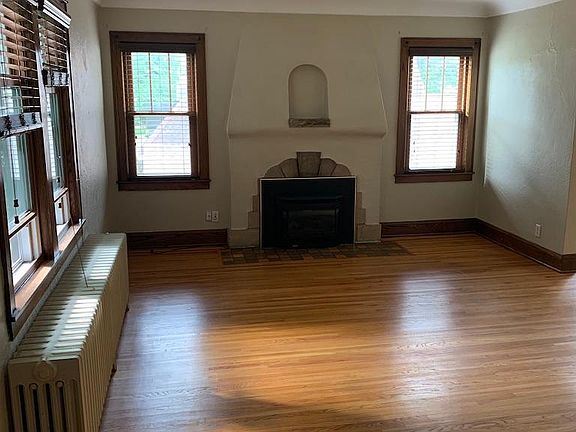 Light and bright with many updated windows and gas fireplace