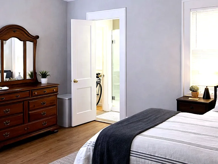 Bedroom with view of ensuite entrance