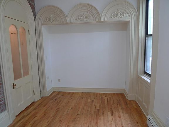 5. Bedroom /closet with cut glass panes and period hardware /window
