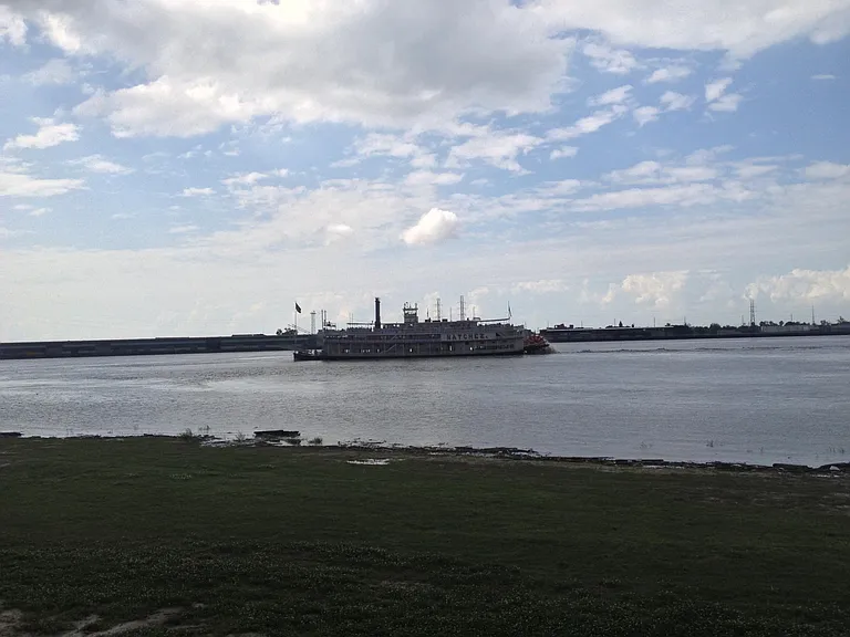 view from walking /jogging and bicycle lighted path on top of levy across from property