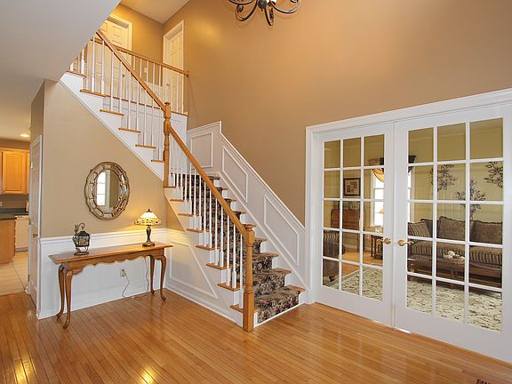 Inviting entry hall with French doors