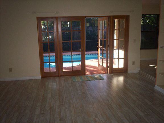 Living Room with French doors to Pool