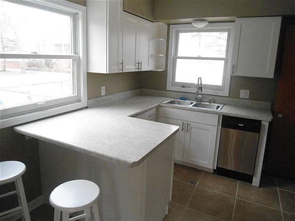 Amazing custom kitchen with seating at custom counter-top